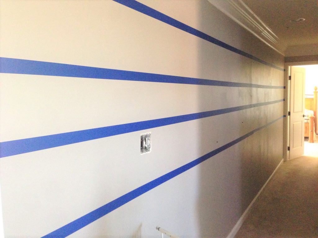 Using painter's tape for this hallway paint idea